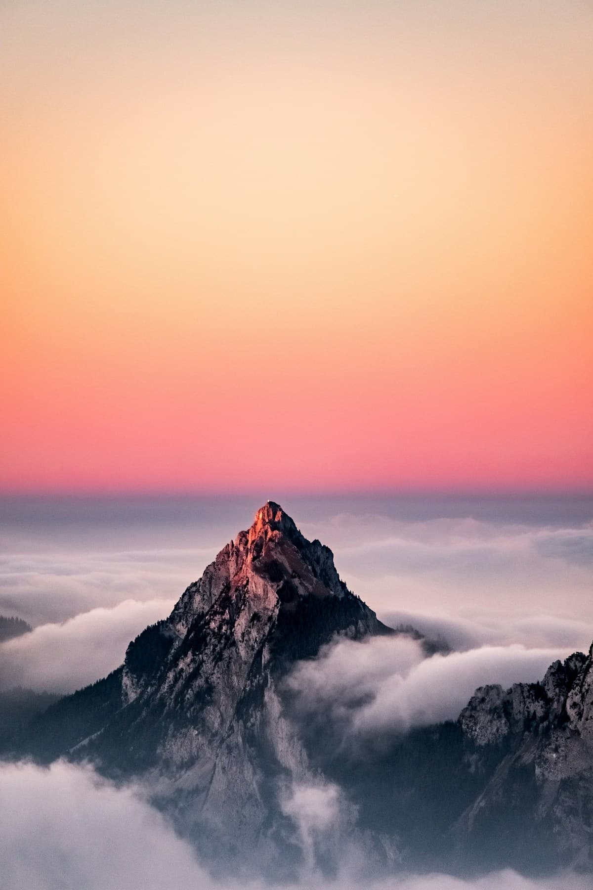 Mountain peak above the clouds